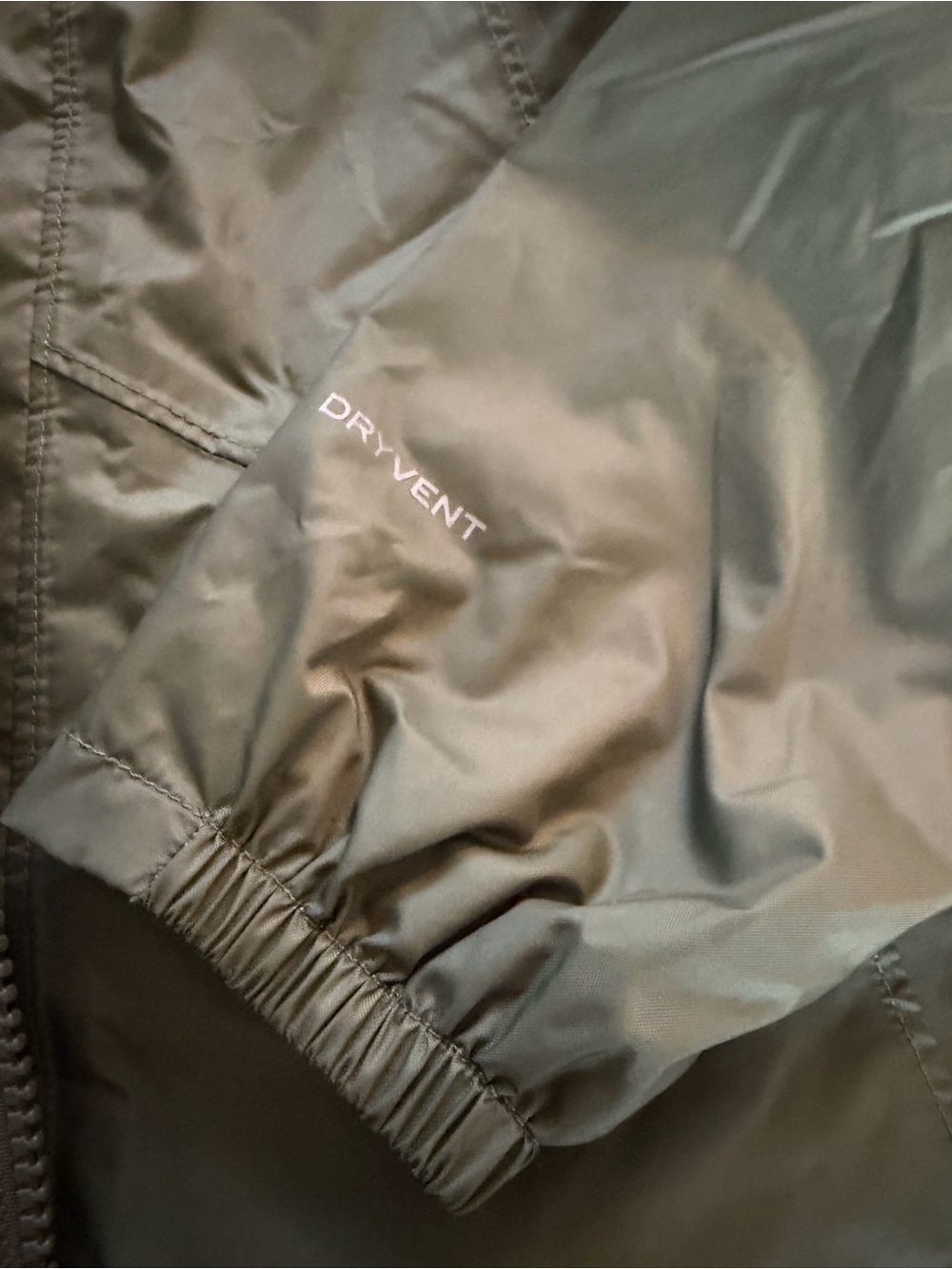 The North Face Olive Green Kids' Raincoat with Pink Lining - Picture 8 of 10